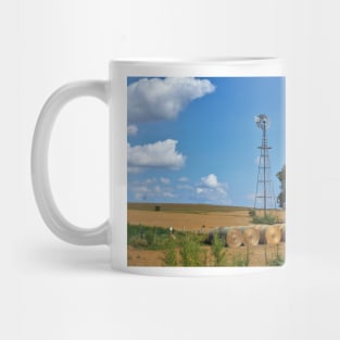 Kansas Windmill with Hay Bales and sky. Mug